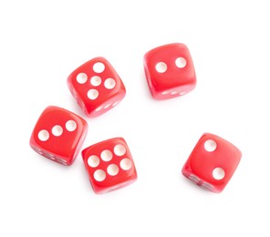 Photo of Many red game dices isolated on white, top view