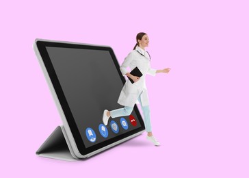 Image of Online medicine. Doctor and modern tablet on pink background