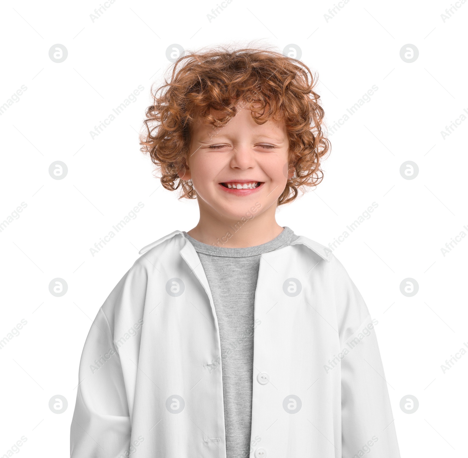 Photo of Portrait of little boy in medical uniform on white background