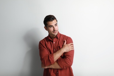 Portrait of handsome young man on white background