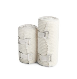 Photo of Medical bandage rolls on white background. First aid items