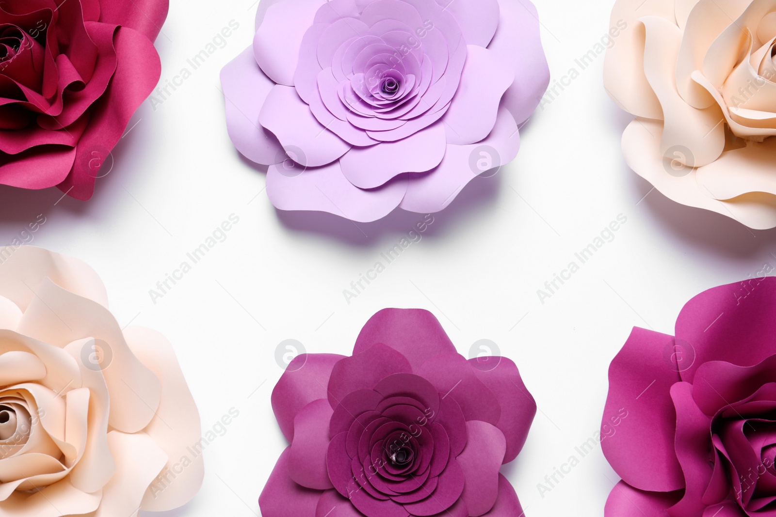 Photo of Different beautiful flowers made of paper on white background, top view