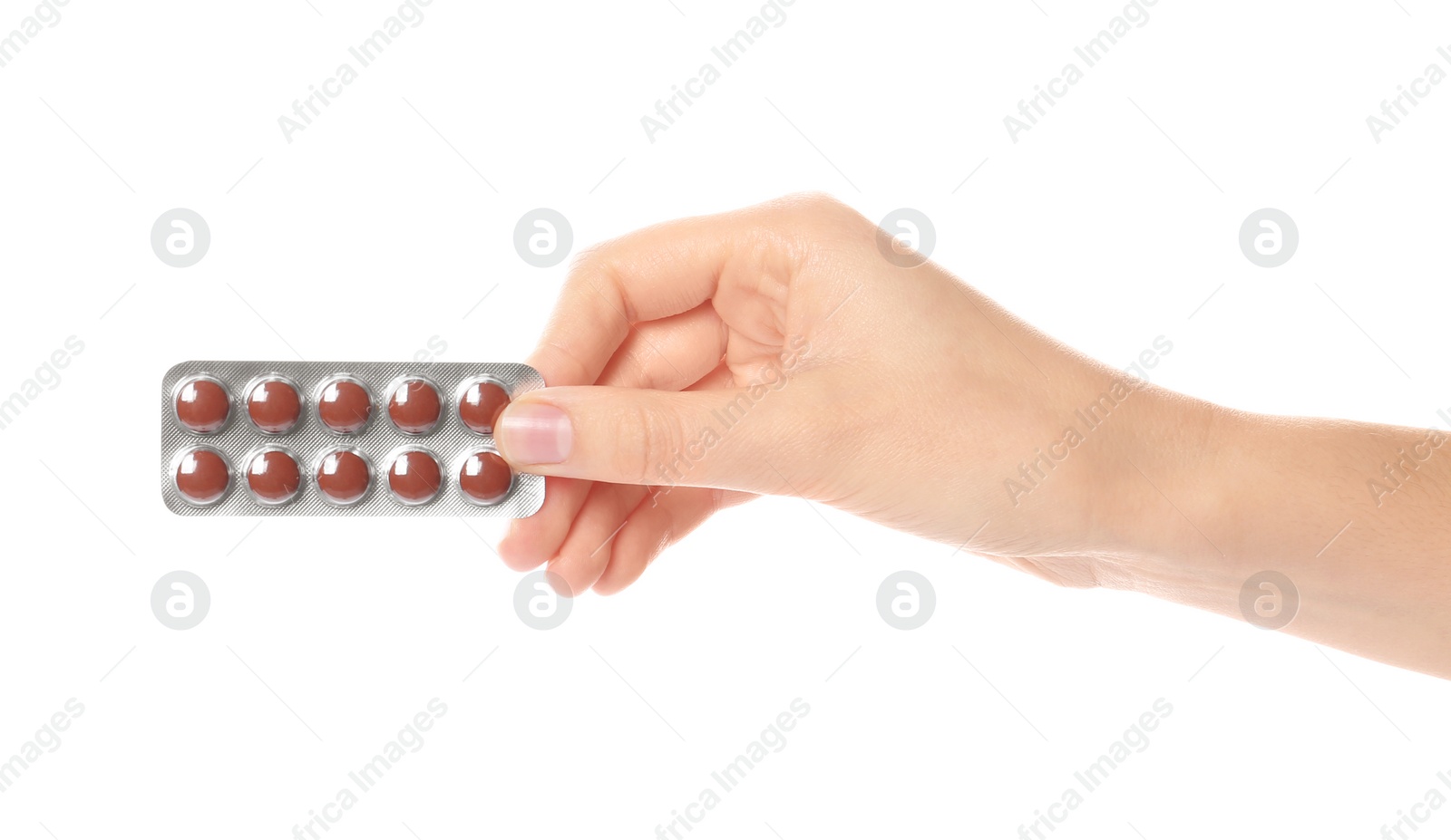 Photo of Woman holding pills in blister pack on white background, closeup