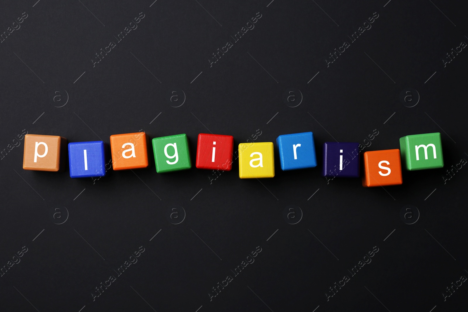 Photo of Colorful cubes with word Plagiarism on black background, flat lay