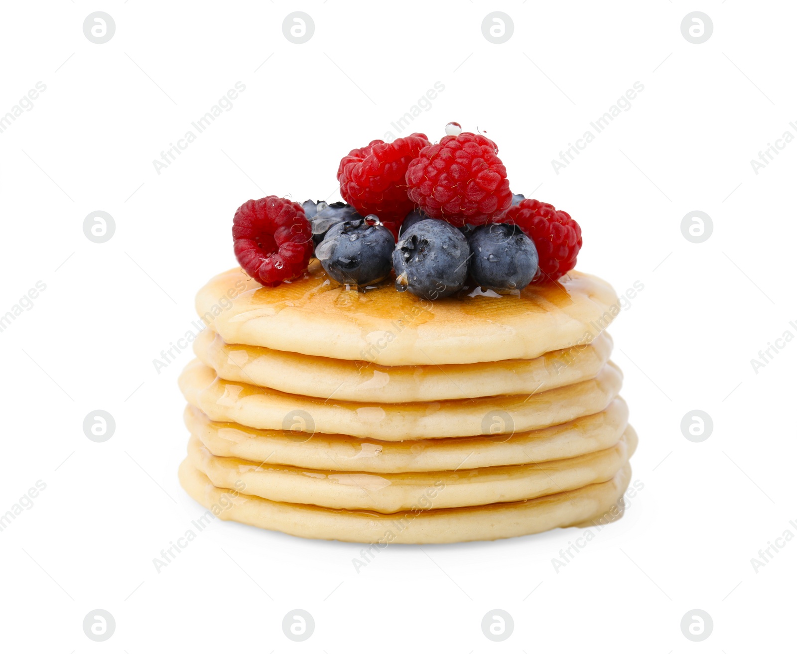 Photo of Delicious pancakes with berries and honey isolated on white