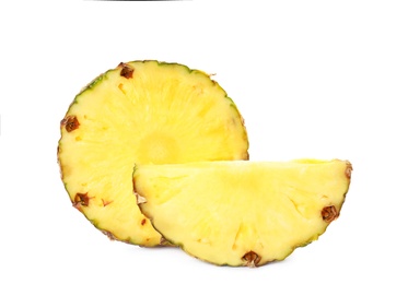 Photo of Slices of fresh pineapple isolated on white