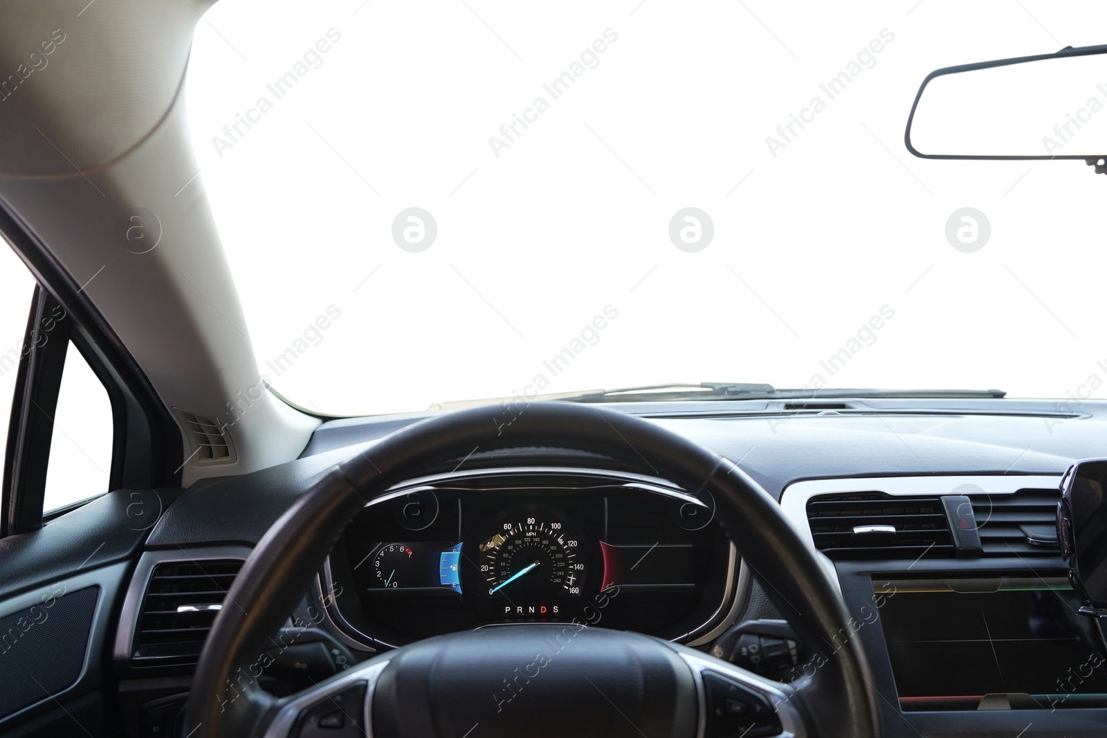 Photo of Speedometer on dashboard and steering wheel inside car