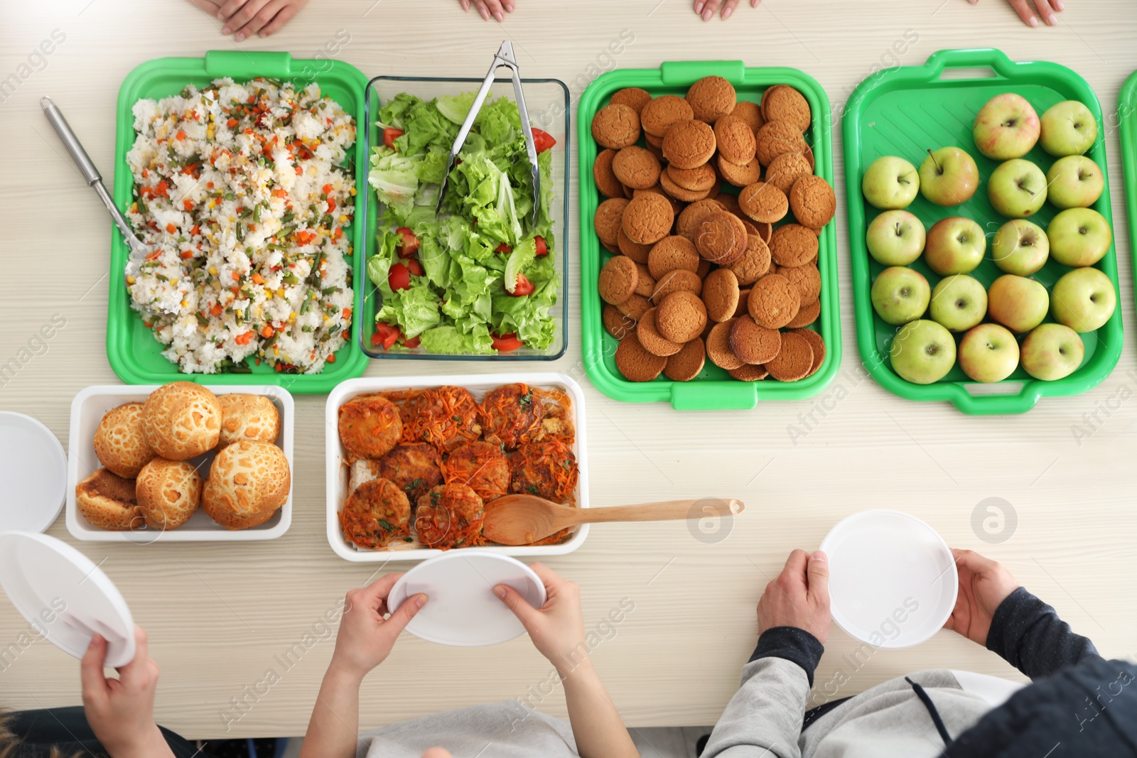 Photo of Table with food prepared by volunteers for poor people, top view