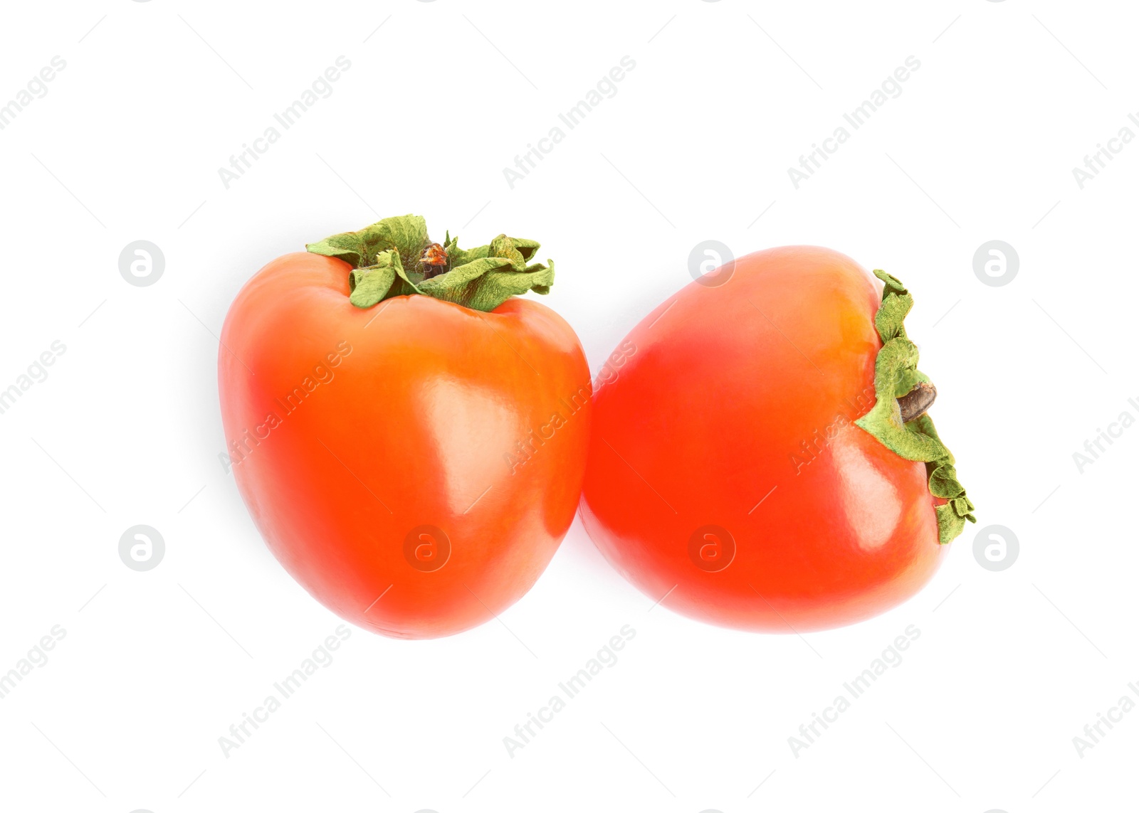 Photo of Delicious fresh ripe persimmons isolated on white, top view