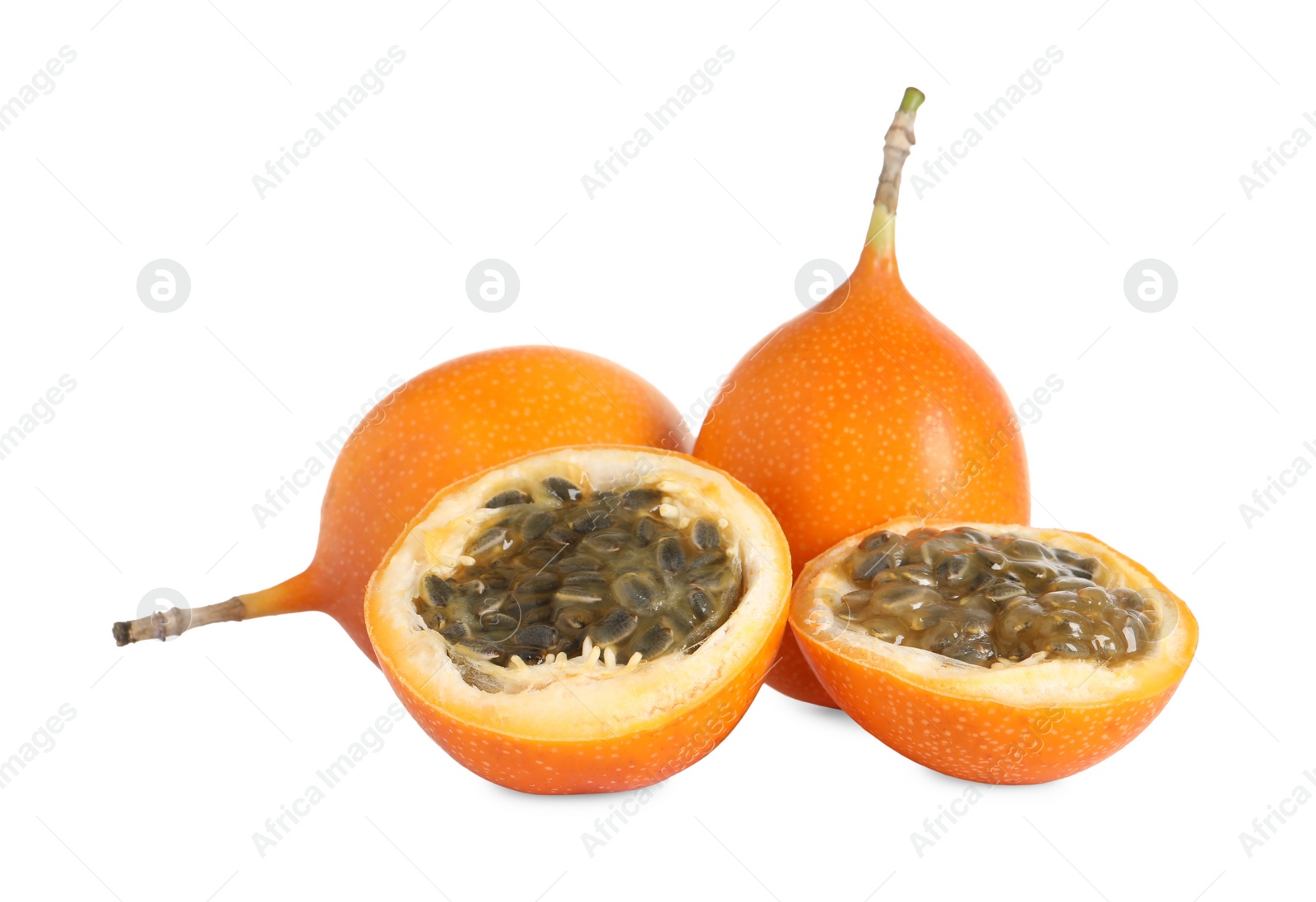 Photo of Whole and cut delicious ripe granadillas on white background