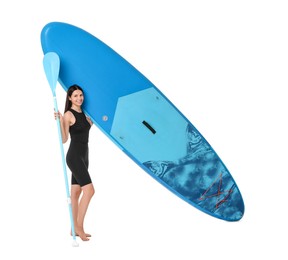 Happy woman with blue SUP board and paddle on white background