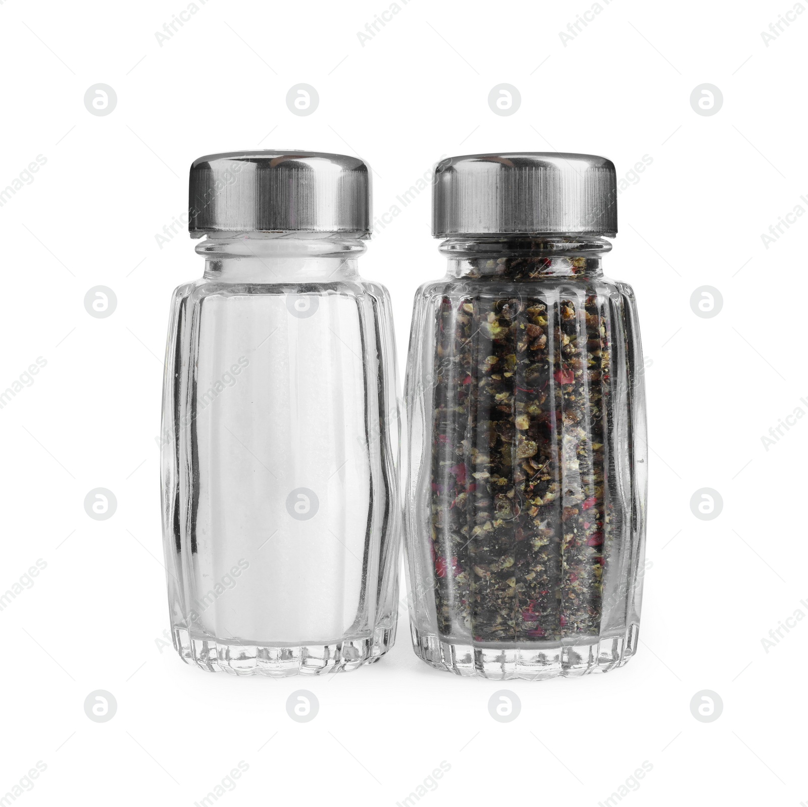 Photo of Salt and pepper shakers isolated on white