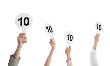 Photo of Panel of judges holding signs with highest score on white background, closeup