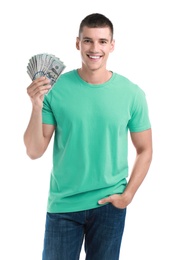 Handsome young man with dollars on white background