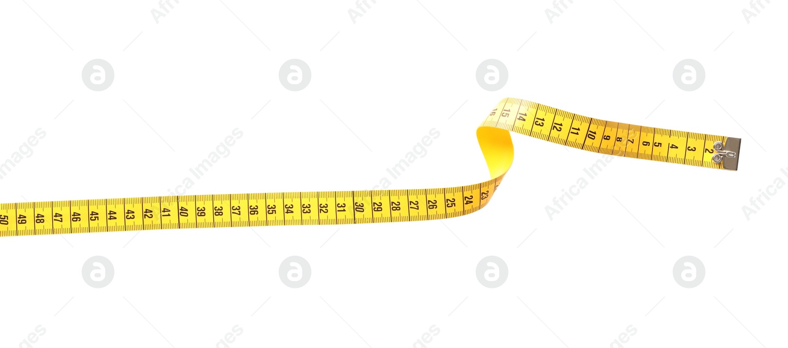 Photo of New yellow measuring tape isolated on white, top view