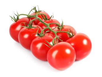 Photo of Branch with ripe cherry tomatoes isolated on white