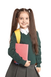 Little girl in stylish school uniform on white background