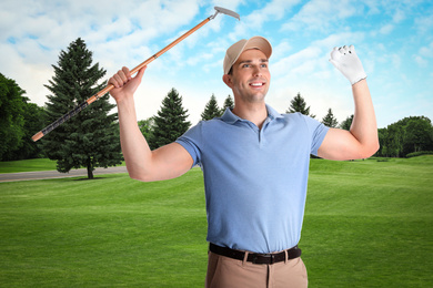 Image of Young man with golf club on green course