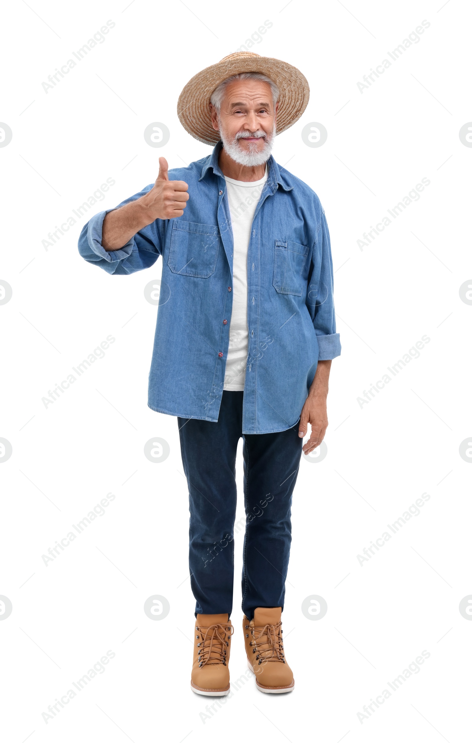 Photo of Happy farmer showing thumb up on white background. Harvesting season