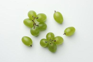 Photo of Fresh grapes on white background, top view
