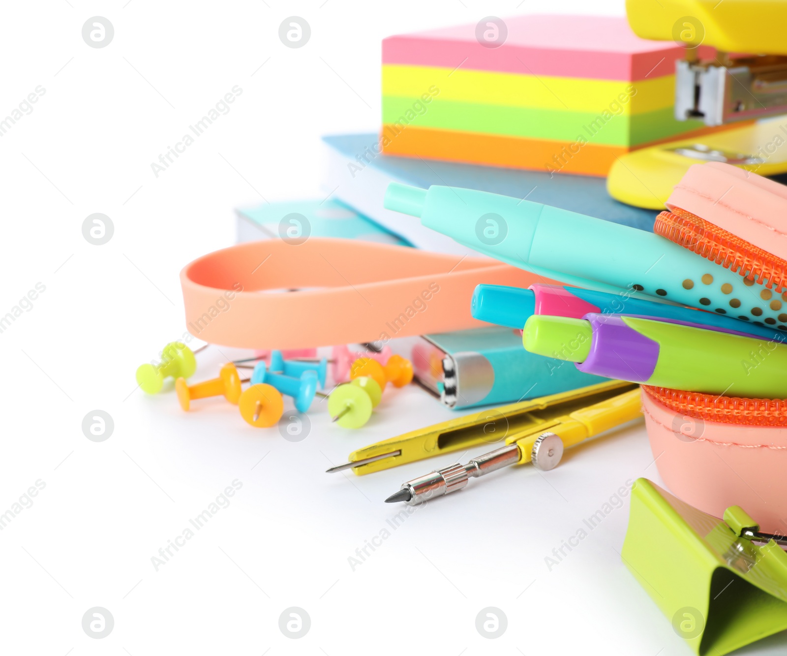 Photo of Different colorful stationery on white background. Back to school