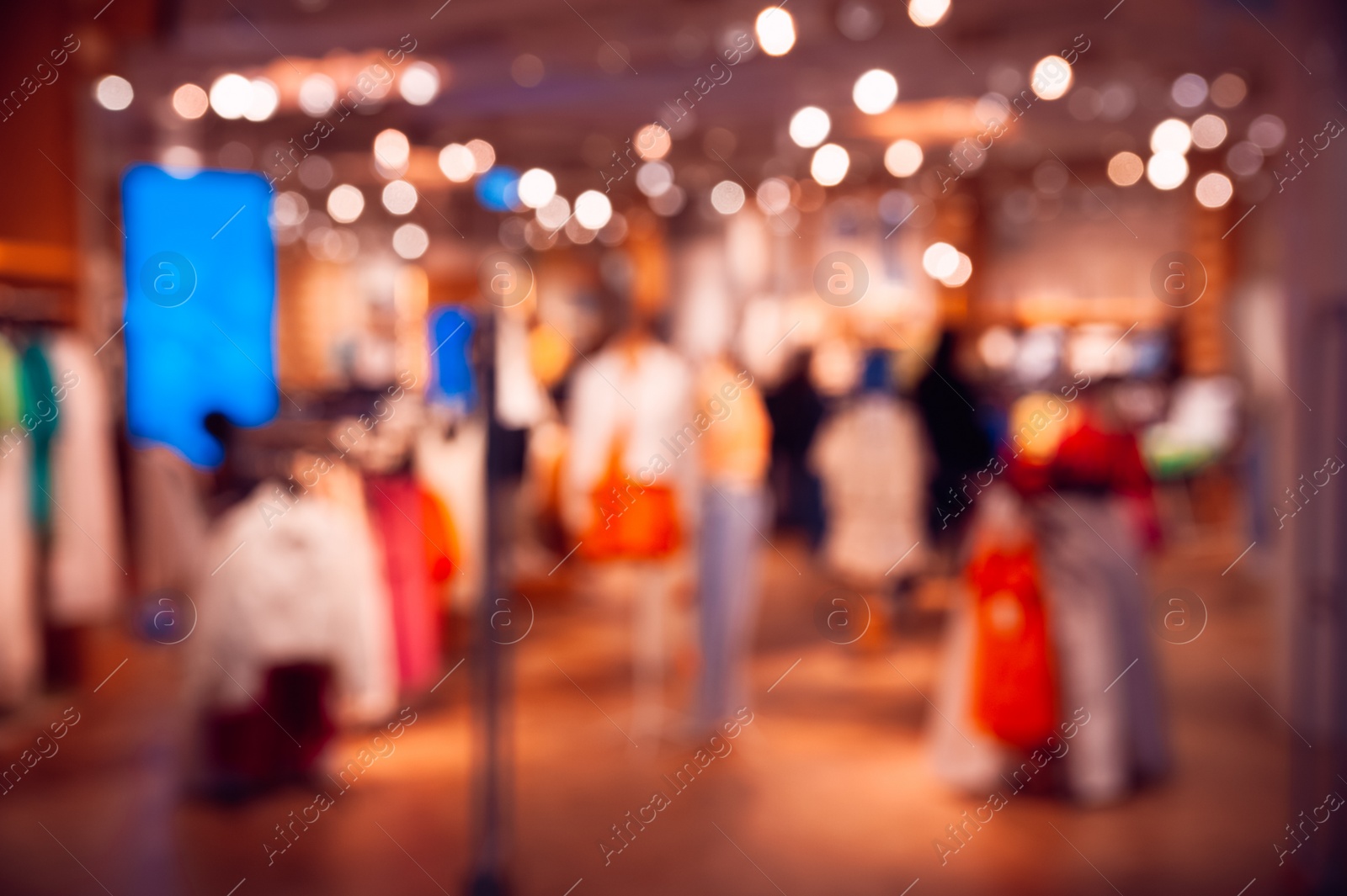 Photo of Blurred view of clothing store, bokeh effect