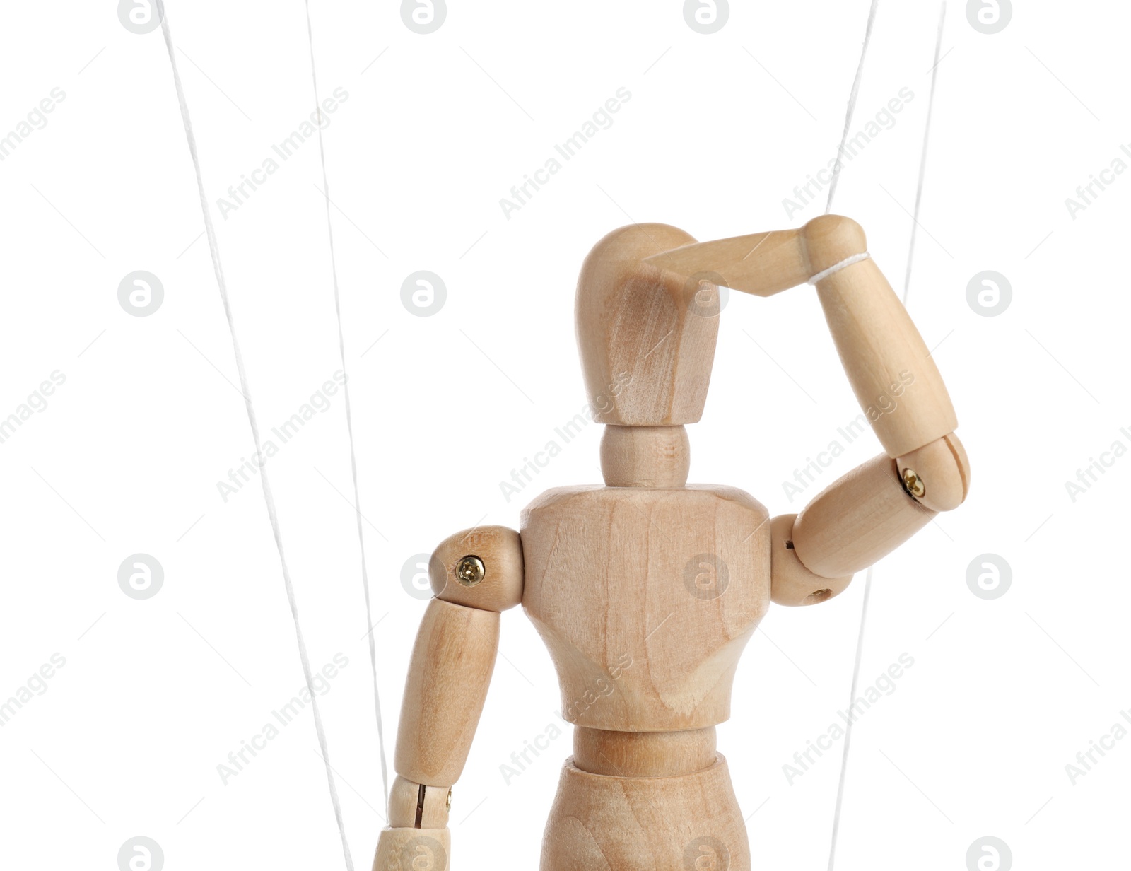 Photo of One wooden puppet with strings on white background