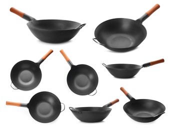 Set with empty woks on white background