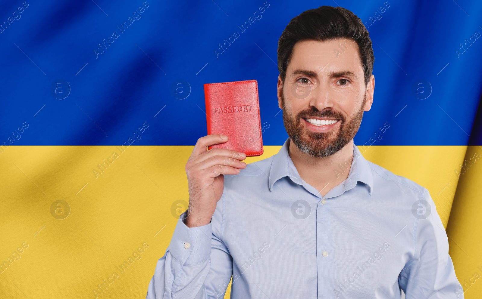 Image of Immigration. Happy man with passport against national flag of Ukraine, space for text. Banner design