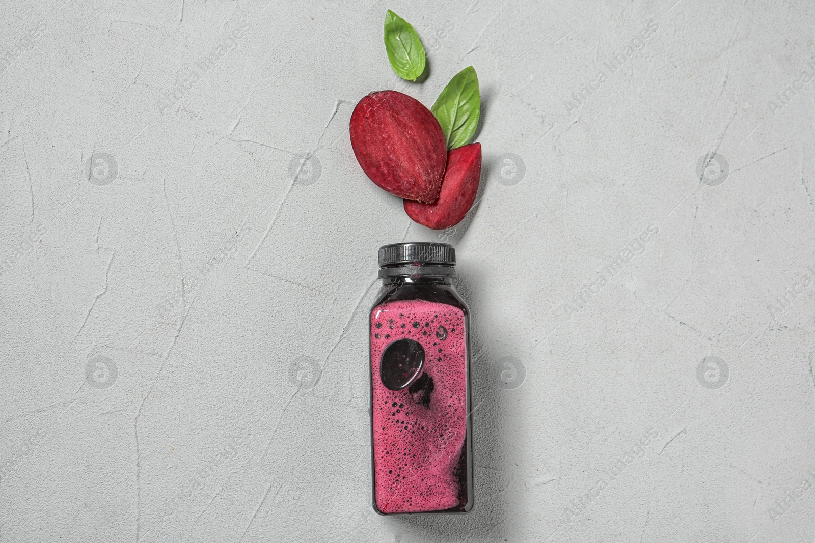 Photo of Flat lay composition with beet smoothie on light background