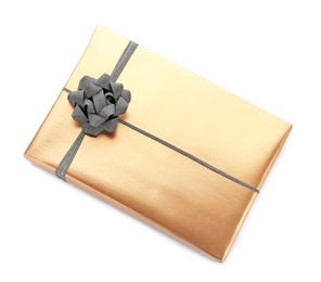 Photo of Golden gift box with black ribbon on white background, top view