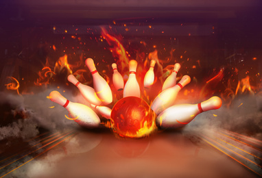 Image of Flaming bowling ball bouncing pins. Successful hit - strike