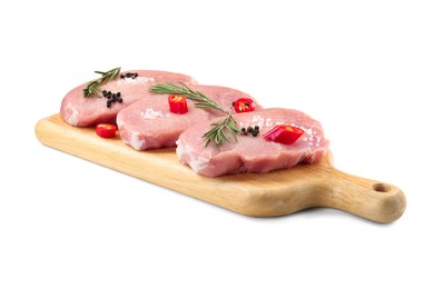 Photo of Wooden board with pieces of raw pork meat and spices isolated on white