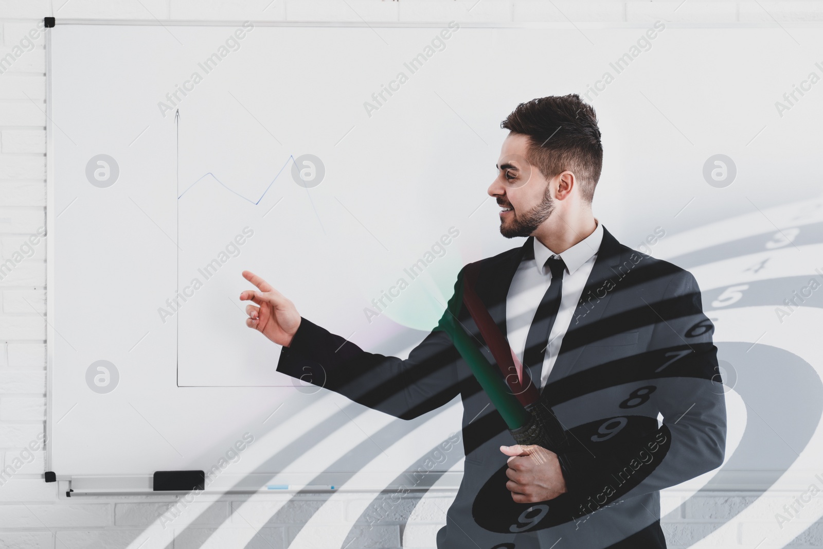 Image of Young businessman in office and dart board with arrows. Double exposure