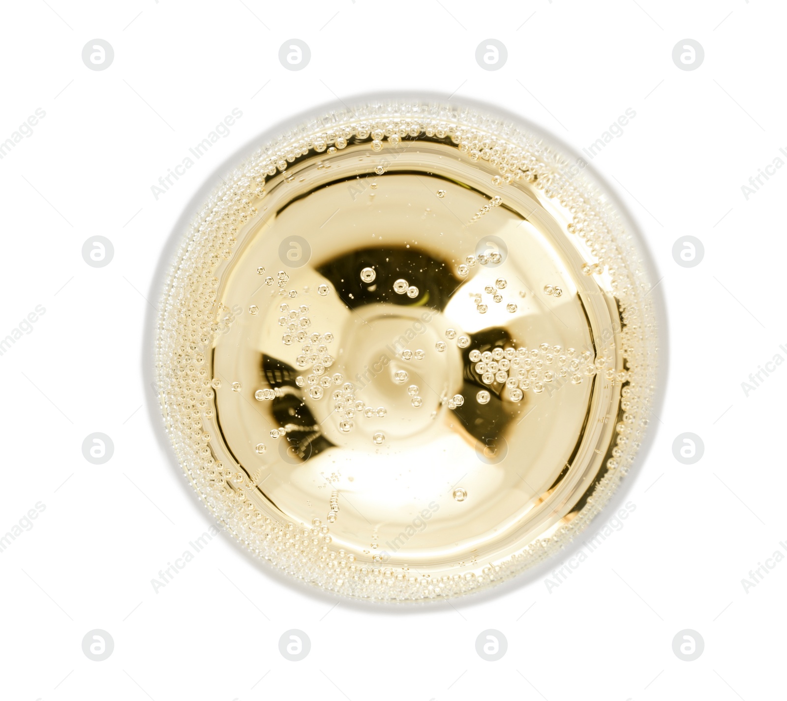 Photo of Glass of champagne on white background, top view. Festive drink