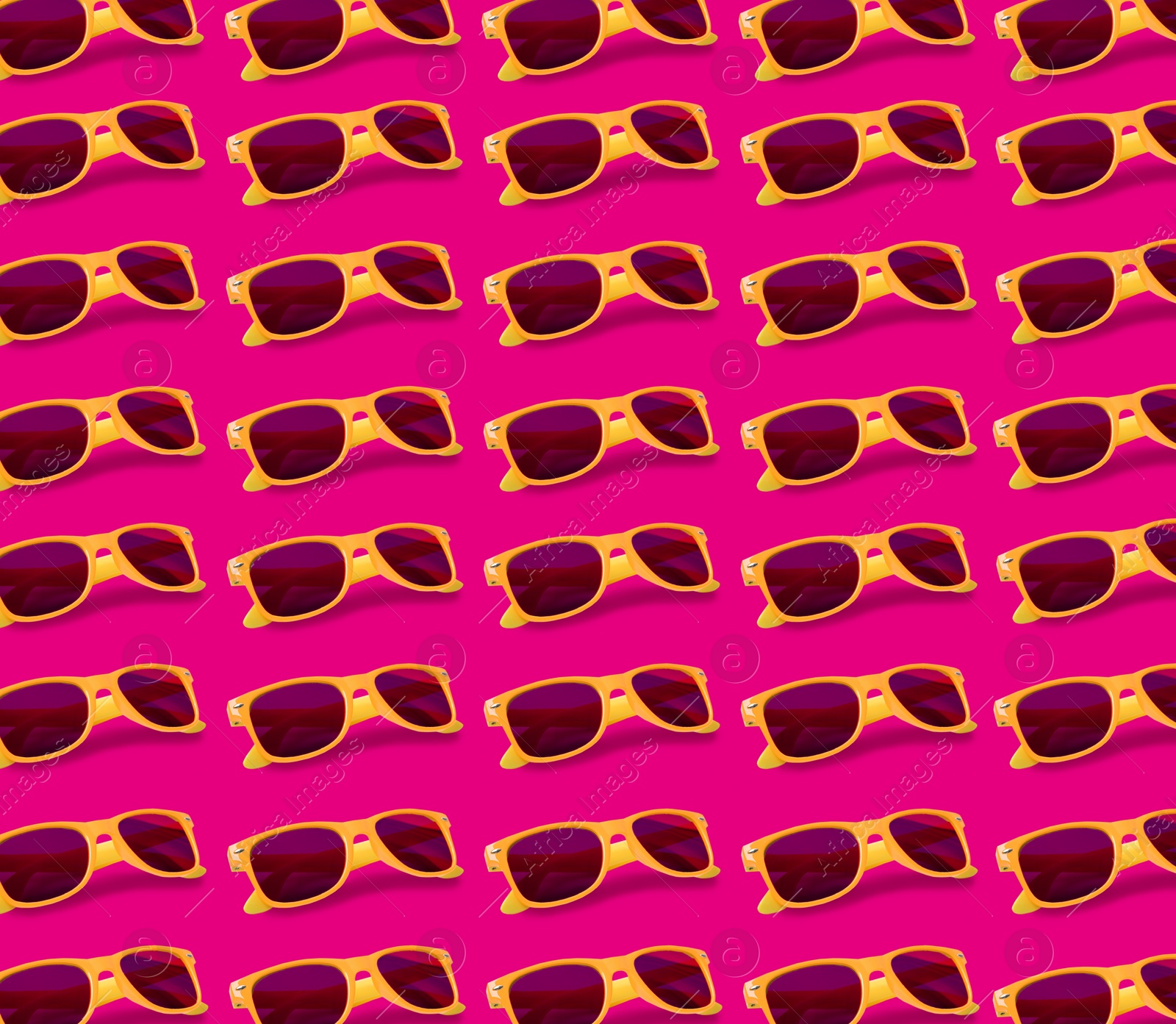 Image of Many stylish sunglasses on pink background. Seamless pattern design