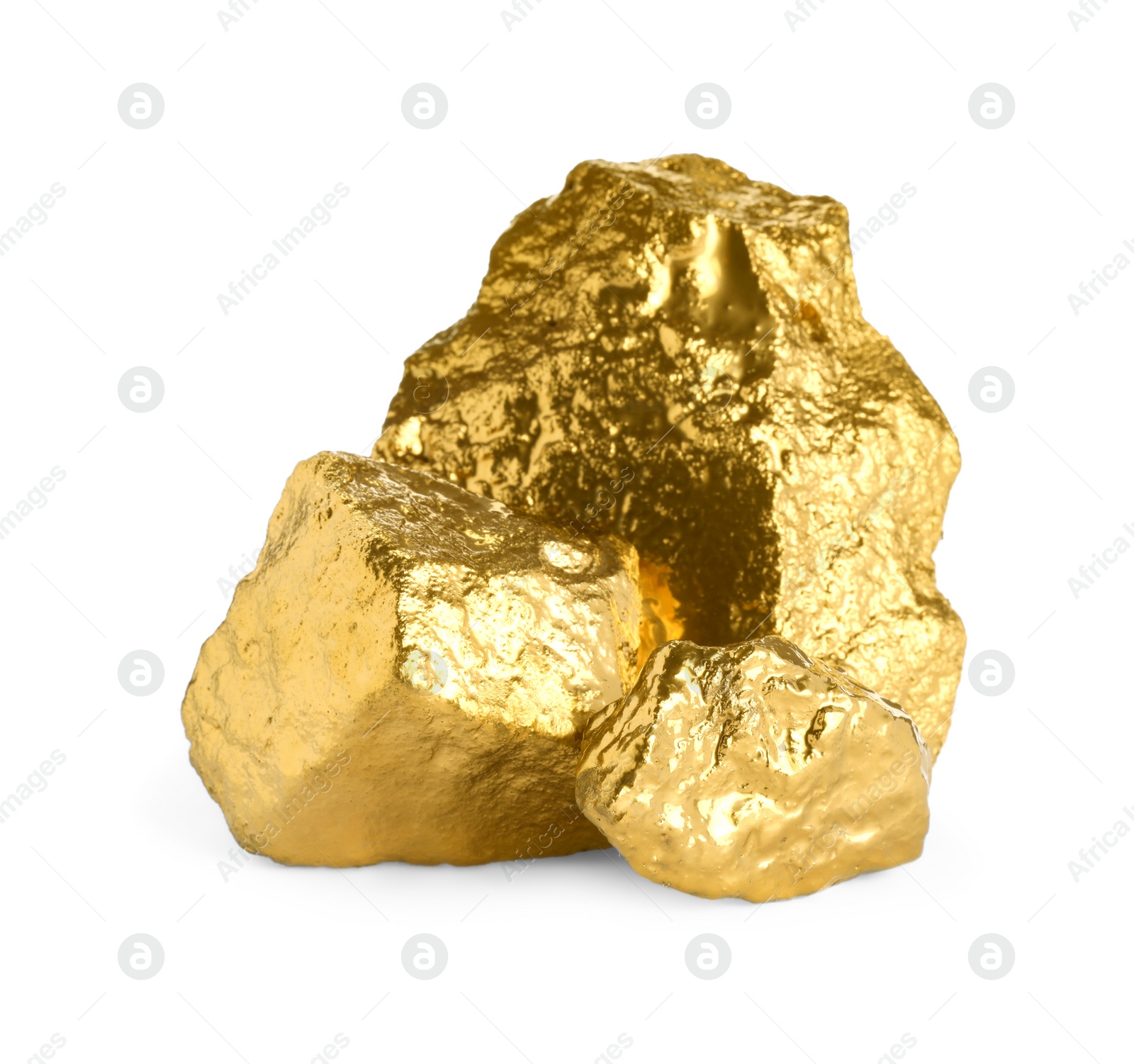 Photo of Three shiny gold nuggets on white background