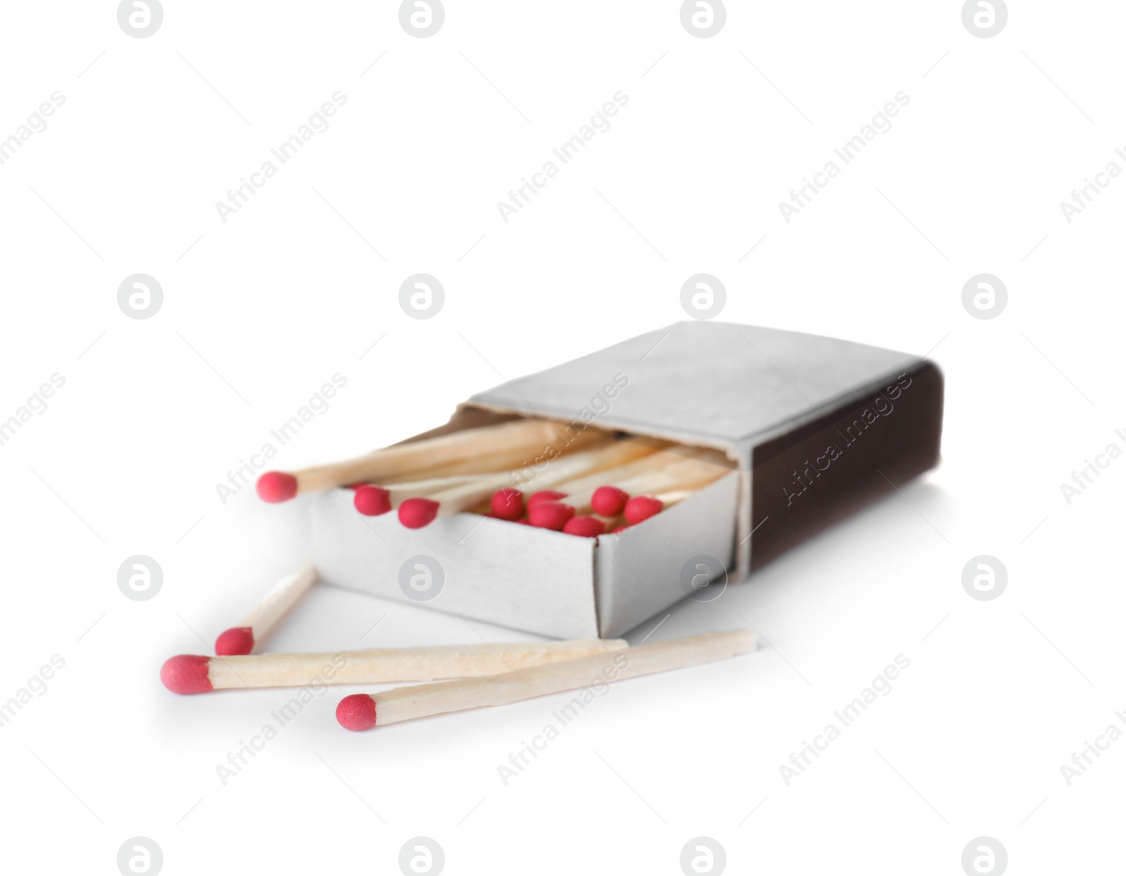 Photo of Cardboard box with matches on white background