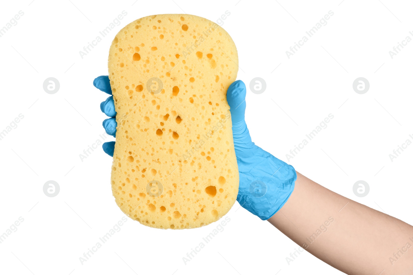 Photo of Cleaner in rubber glove holding new yellow sponge on white background, closeup