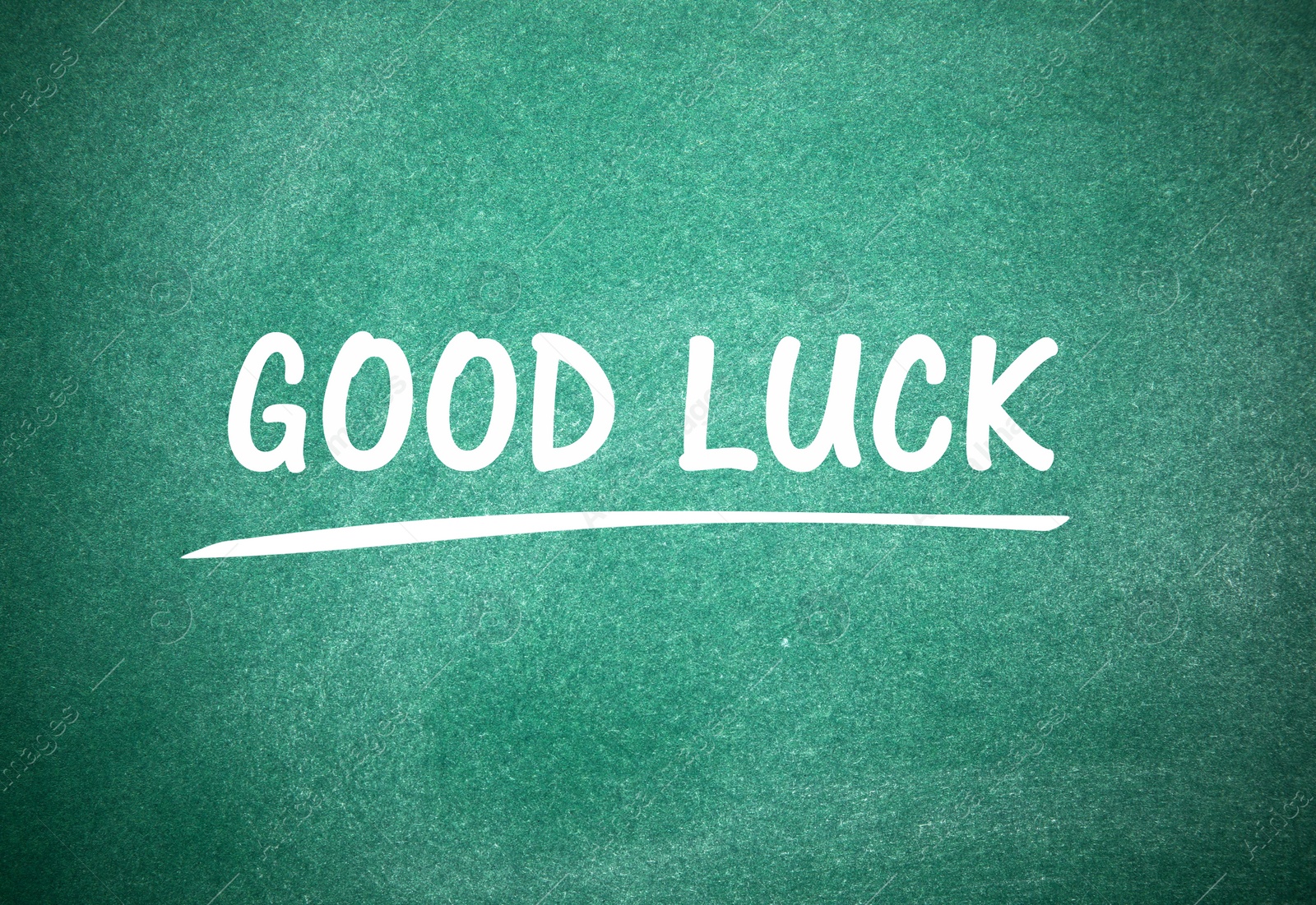 Image of Phrase GOOD LUCK written on green chalkboard