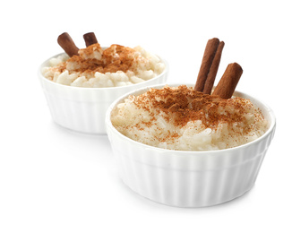 Delicious rice pudding with cinnamon isolated on white