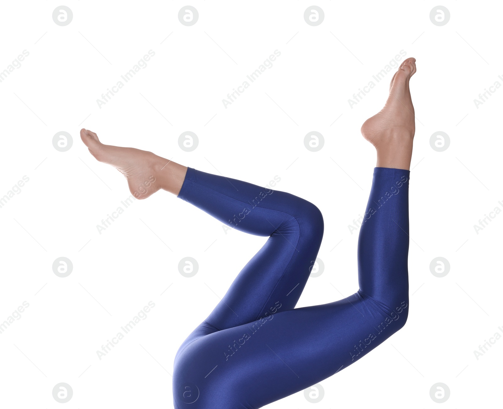 Photo of Woman with beautiful long legs wearing blue leggings on white background, closeup