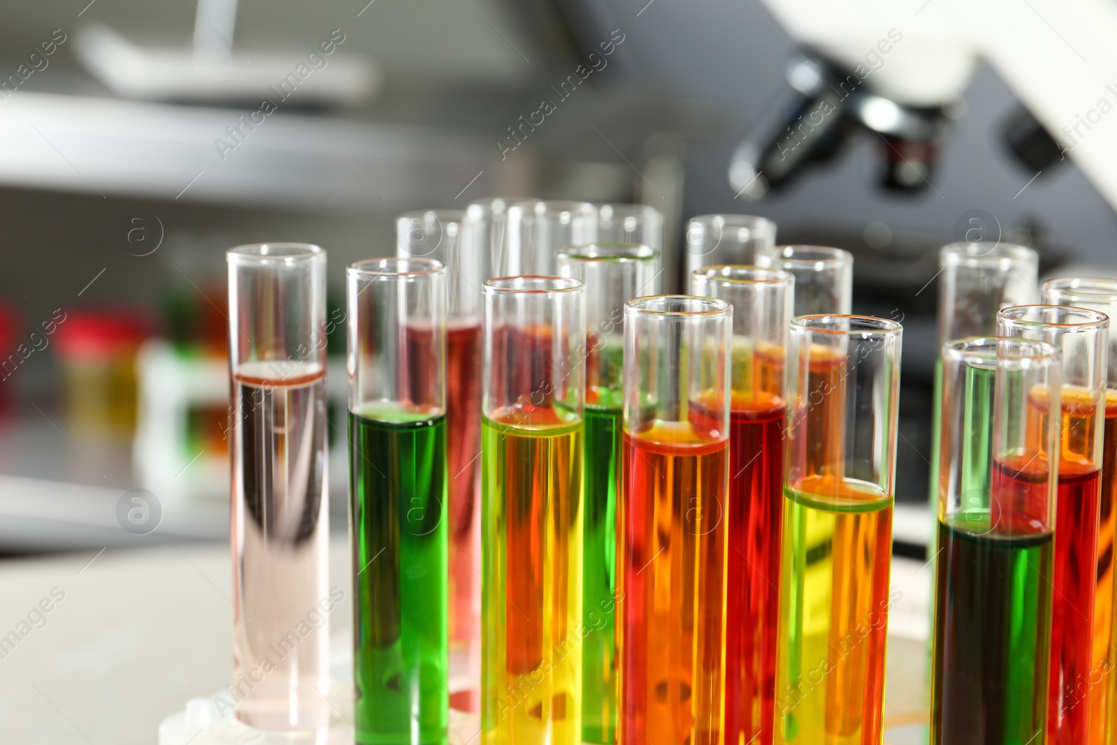 Photo of Test tubes with samples in chemistry laboratory, closeup