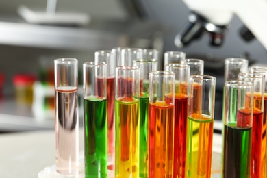 Photo of Test tubes with samples in chemistry laboratory, closeup