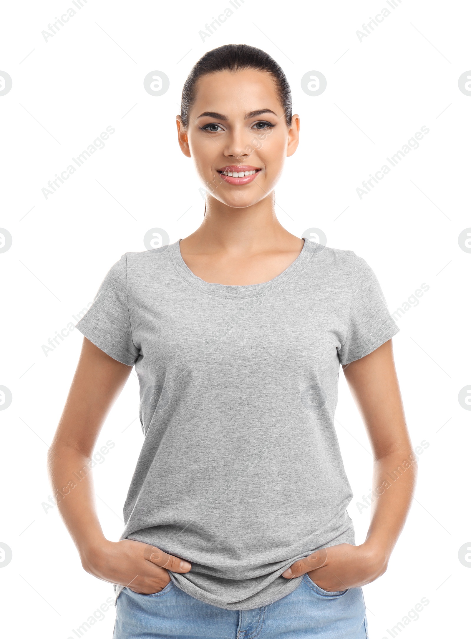 Photo of Young woman in t-shirt on white background. Mockup for design