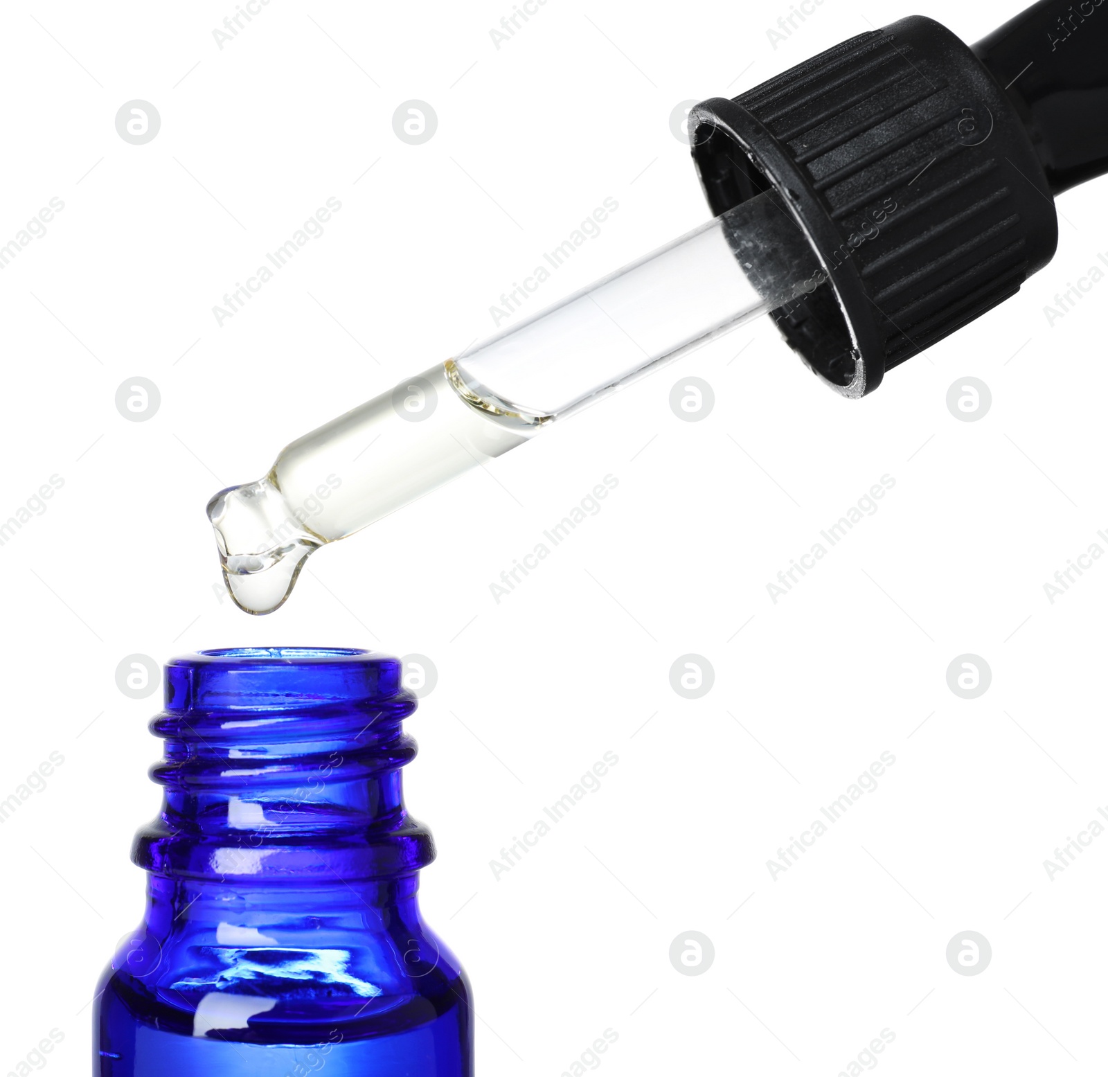 Photo of Bottle and pipette with essential oil on white background, closeup