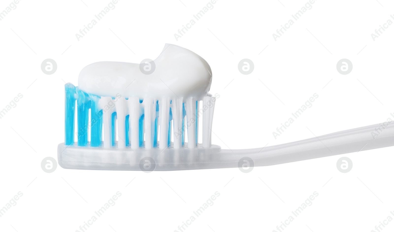 Photo of Plastic toothbrush with paste on white background, closeup