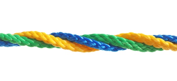 Photo of Twisted colorful ropes on white background. Unity concept