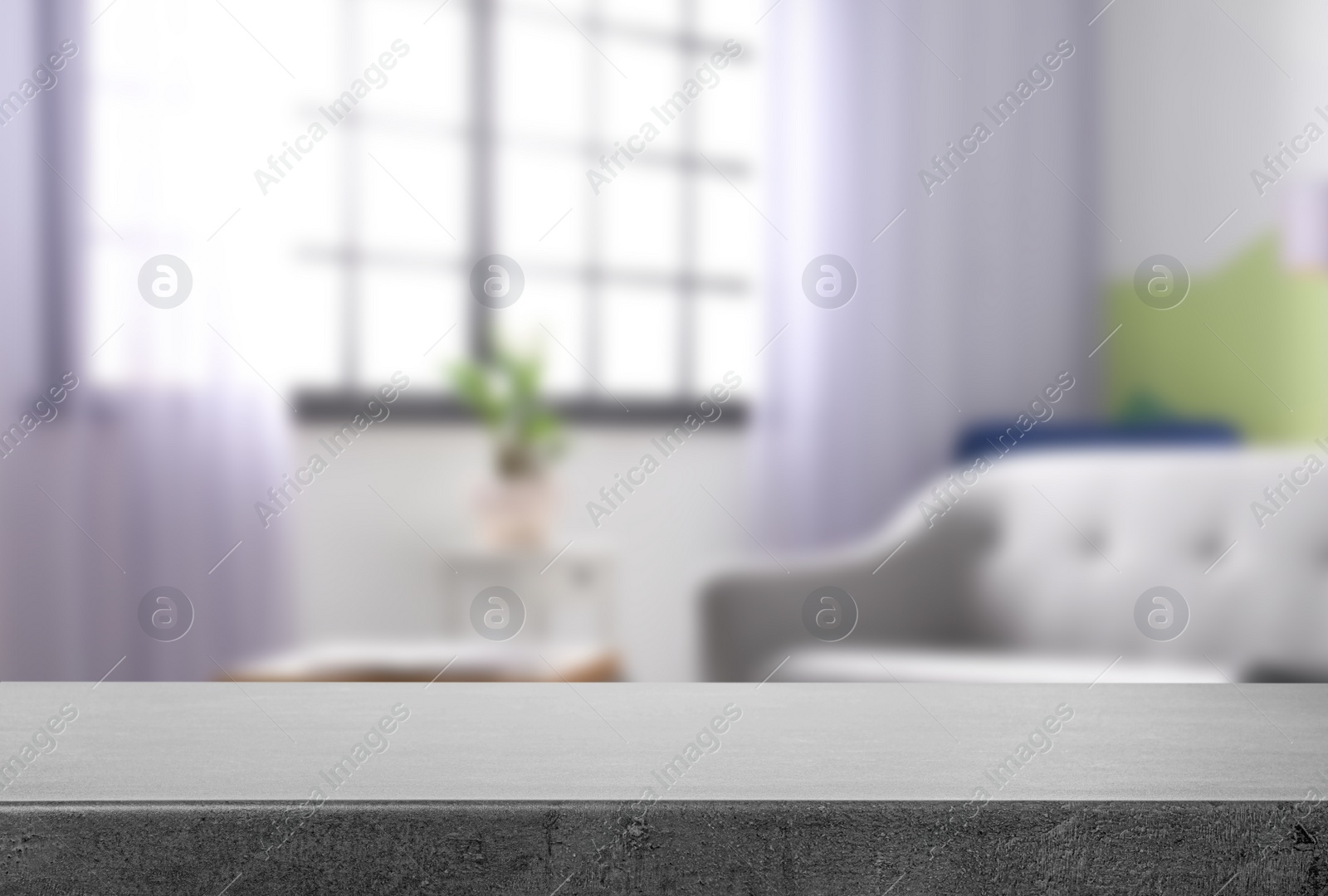 Image of Empty grey stone surface and blurred view of modern window 