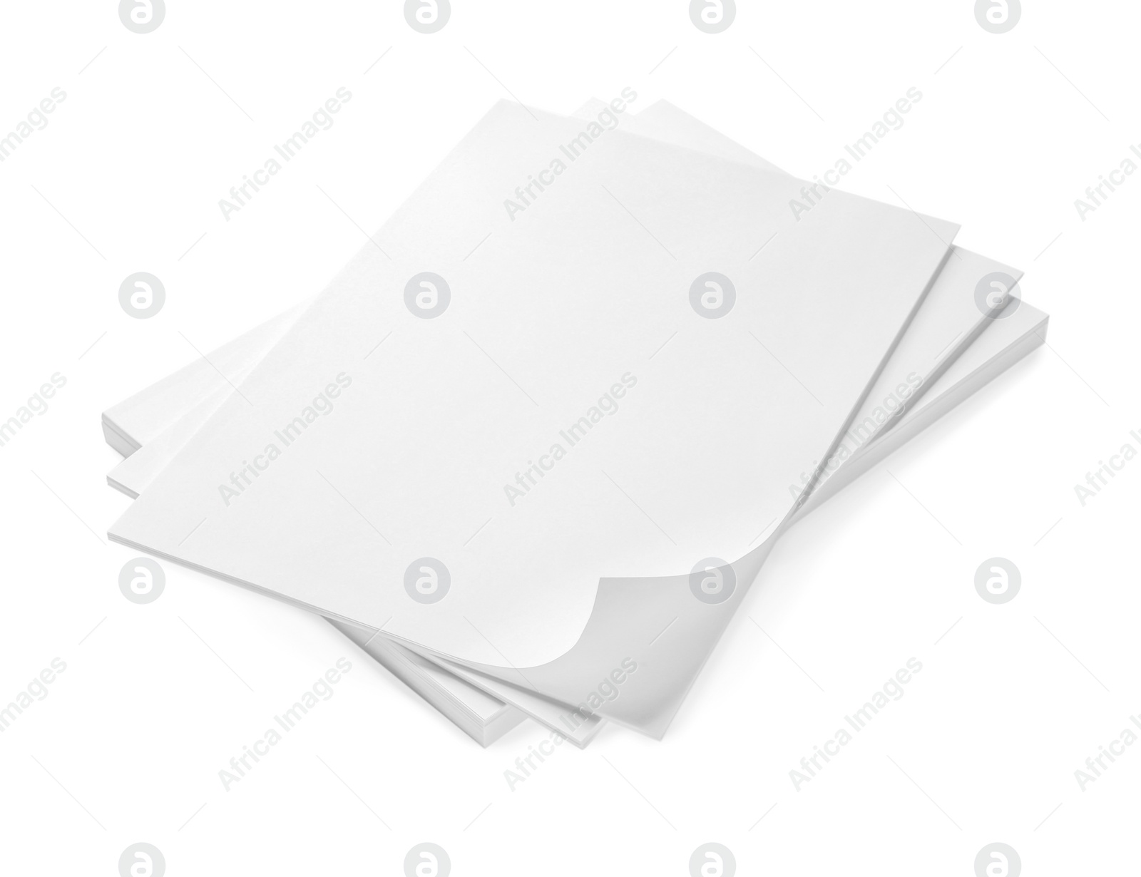 Photo of Stack of paper sheets on white background